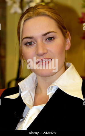 British actress Kate Winslet on GMTV's 'Lorraine' show with Lorraine Kelly in London. The 26-year-old actress, who is dating American Beauty director Sam Mendes, was Sunday night at the premiere of her new film, 'Iris', * which is the touching love story of novelist and philosopher Iris Murdoch and her husband John Bayley. Stock Photo