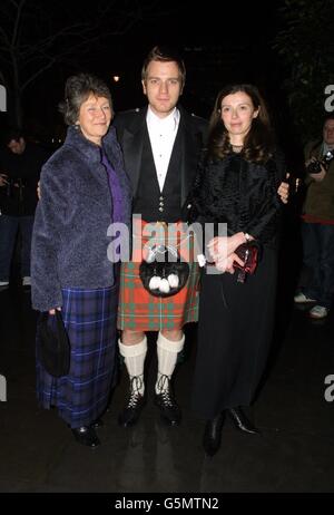 Actor Ewan McGregor with his mother Carol and wife Eve, arriving for a Burns Supper at the St Martins Lane Hotel, London, in aid of Sargent Cancer Care for Children and Rachel House Children Hospice. Stock Photo