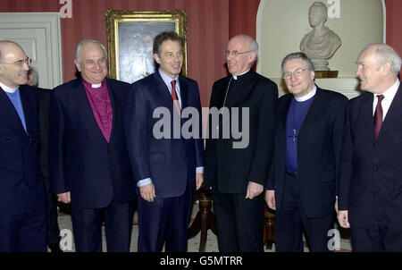 Left to Right: President of the Methodist Church in Ireland Rev Harold Good, Church of Ireland Archbishop of Armagh Dr Robin Eames, Prime Minister Tony Blair, Roman Catholic Archbishop of Armagh. * ... Dr Sean Brady, Moderator of the Presbyterian Church in Ireland Dr Alastair Dunlop, and Northern Ireland Secretary John Reid. Representatives of the major faiths were meeting to reject violence in all forms and pray for peace. Key figures from nine faiths ranging from the Baha'i tradition to Buddhists, Christians, Jews, Muslims and Sikhs were due to take part in the service in central London. Stock Photo