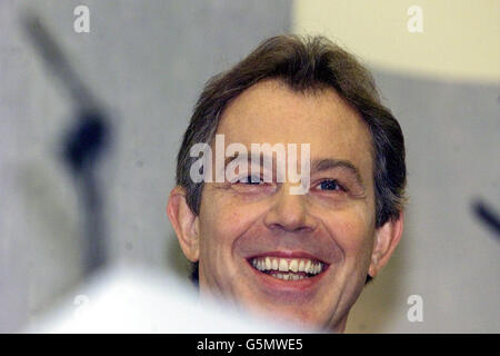 Prime Minister Tony Blair smiles after delivering a speech on public services at the Centre of Life in Newcastle. The Prime Minister praised the dedication of public service workers, putting in millions of hours of unpaid overtime and providing services. * that were often stunningly successful. While he acknowledged that not everything in the public services was perfect, he said the debate could not be a matter of one individual case, no matter how hotly contested. In his speech the premier accused the Government's opponents of deliberately undermining public services in an attempt to Stock Photo