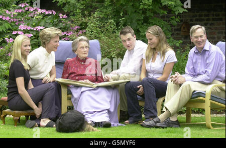 HRH Princess Alice (3rd L) with her son the Duke of Gloucester (R) daughter-in-law the Duchess of Gloucester (2nd L) and her grandchildren, Lady Davina Windsor, 24 (L), Lady Rose Windsor, 21, (R), and Alexander the Earl of Ulster, 27 (2nd R). * Princess Alice, the Queen's aunt and dowager Duchess of Gloucester, is today celebrating her 100th birthday, her longevity is surpassed within the Royal Family only by the Queen Mother who is 17 months her senior. In this rare appearance the frail princess is pictured from earlier this year enjoying celebrations, in the gardens of her home in Stock Photo