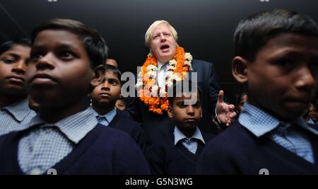 London Mayor Boris Johnson meets students and pupils during a visit to Amity University in Uttar Pradesh near Delhi, where he addressed members of the university and took questions from Indian students, as part of a week long tour of India to persuade Indian businesses to invest in London. Stock Photo