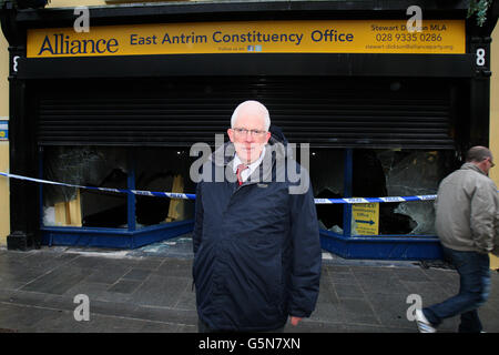 Alliance MLA Stewart Dickson in Carrickfergus, Co Antrim beside his office, as more attacks have been carried out on the non-sectarian Alliance Party during a night of violence in Northern Ireland. Stock Photo