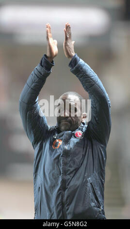 Charlton Athletic manager Chris Powell applauds the crowd after the npower Football League Championship match at The Valley, London. Stock Photo
