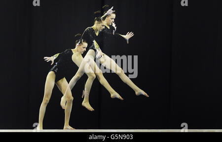 **EDITORS PLEASE NOTE - Multiple exposure created in camera** Rebecca Tunney on the WA Balanace Beam during the Glasgow World Cup at the Emirates Arena, Glasgow. Stock Photo