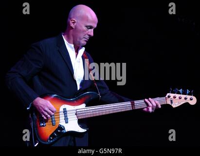 Dave Pegg of Fairport Convention perfoming on stage at the Royal Festival Hall in London as part of their 35th annivesary tour. Stock Photo