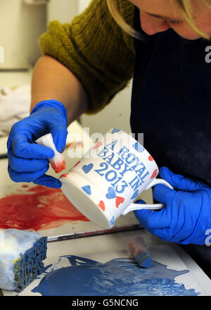 Commemorative mugs being produced at the Emma Bridgewater Pottery in Stoke On Trent. Stock Photo