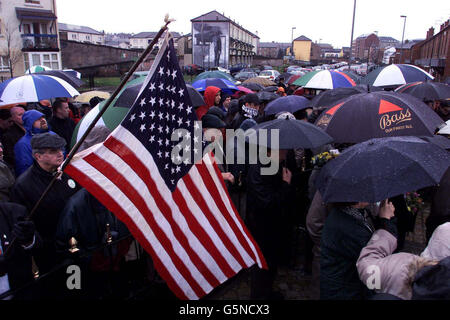 An American flag is waved at the service to mark the 30th anniversary of Bloody Sunday in Londonderry. Thousands of people gathered in Londonderry to retrace the ill-fated route of the Bloody Sunday march in 1972 where 13 people were shot dead. * ... by the Paratroop regiment. Stock Photo