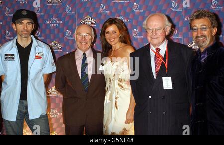 From left to right; former Formula 1 champion Damon Hill, motor racing commentator Murray Walker, TV presenter Carol Vorderman, Professor Sid Watkins and Formula 1 team boss Eddie Jordan during the 2002 Grand Prix Party at The Royal Albert Hall in London. * ... The party is the curtain raiser to the Formula 1 season bringing the stars together in aid of the Brain & Spine Foundation. Stock Photo