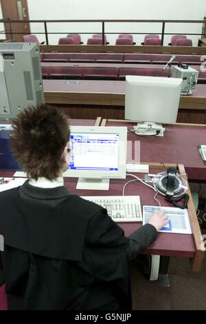 The Clarke of the Court using the new text messaging system which was The Clarke of the Court using the new text messaging system which was