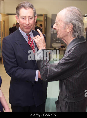 The Prince of Wales with former Daily Express journalist Les Poole, now a patient on the Liver Cancer ward at the University Hospital, Aintree in Liverpool, during his visit to the hospital. Stock Photo