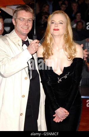 Actress Nicole Kidman with film director Stephen Daldry arrive for the Orange British Academy Film Awards at the Odeon cinema in London's Leicester Square. Stock Photo