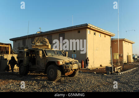 A foxhound patrol vehicle sits outside the Afghan police unit at FOB Shawqat, Helmand Province, Afghanistan Stock Photo
