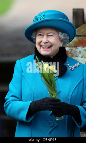 Queen Elizabeth II attends St Mary Magdalene Church, on the royal estate in Sandringham, Norfolk for the traditional Christmas Day church service. Stock Photo