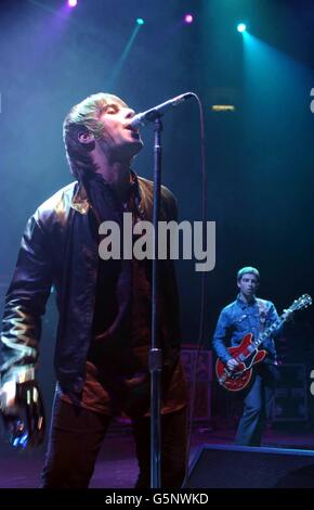 Oasis frontman Liam Gallagher performs on stage at the Royal Albert Hall, London, during a fundraising concert in aid of the Teenage Cancer Trust. Stock Photo