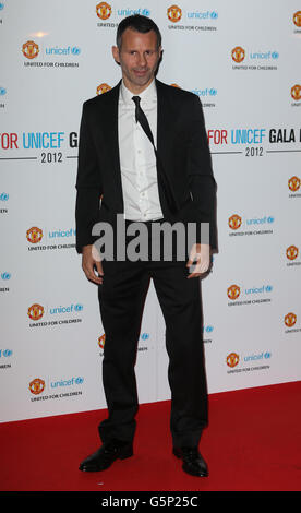 Manchester United's Ryan Giggs arrives at the clubs' Old Trafford stadium for the Manchester United UNICEF Gala Dinner. Stock Photo
