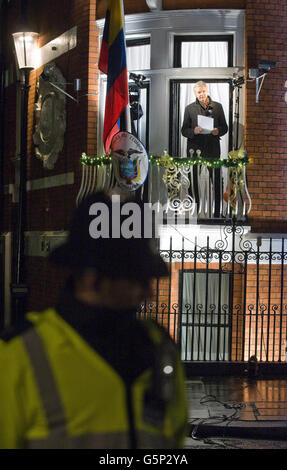 Julian Assange speaks on the balcony of the Ecuadorian Embassy in London. Stock Photo