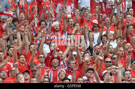 St. Denis, France. 22nd June, 2016. Supporters of Austria cheer before the Group F preliminary round soccer match of the UEFA EURO 2016 between Iceland and Austria at the Stade de France in St. Denis, France, 22 June 2016. Photo: Peter Kneffel/dpa/Alamy Live News Stock Photo