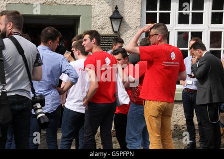 Piercebridge, Darlington, UK. 22nd June, 2016.  Brexit Leave supporters gather outside the George Hotel awaiting the arrival of Boris Johnson at the pub on his 'Leave' campaign trail.David Dixon/Alamy Live News Stock Photo