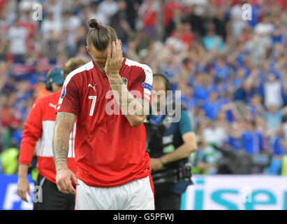 St. Denis, France. 22nd June, 2016. Austria's Marko Arnautovic reacts after loosing the Group F preliminary round soccer match of the UEFA EURO 2016 between Iceland and Austria at the Stade de France in St. Denis, France, 22 June 2016. Photo: Peter Kneffel/dpa/Alamy Live News Stock Photo