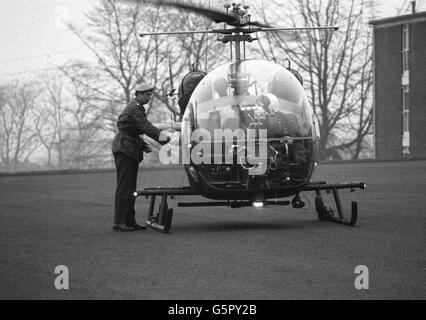 The Duke of Kent, a Major in the Royal Scots Greys now serving with his armoured car squadron in Northern Ireland, boarding an Army Scout helicopter at Omagh Barracks for an air reconnaissance of the border area. There were angry exchanges between Army officers and journalists who were kept more than 75 yards from the Duke and guarded by soldiers and a dog. Stock Photo