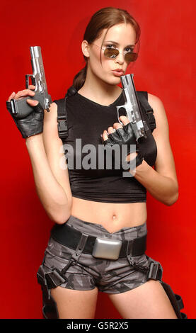 Dutch model, Jill De Jong poses for the media during a photocall in London, after it was announced that she is to play the real-life Lara Croft for promotional purposes for the latest Tomb Raider series of computer. * De Jong, follows in the footsteps of actress Rhona Mitra and fellow model Nell McAndrew. Stock Photo