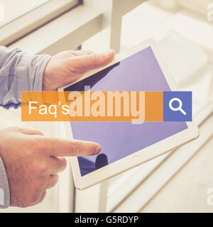 SEARCH TECHNOLOGY COMMUNICATION  Faq's TABLET FINDING CONCEPT Stock Photo