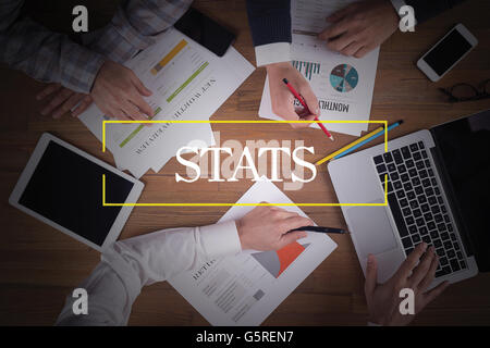 BUSINESS TEAM WORKING OFFICE  Stats TEAMWORK BRAINSTORMING CONCEPT Stock Photo