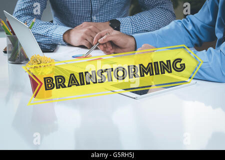 BUSINESS WORKING OFFICE Brainstorming TEAMWORK BRAINSTORMING CONCEPT Stock Photo