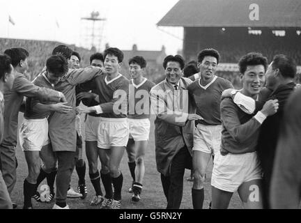 The North Korean footballers mobbed by supporters after their surprise 1-0 defeat of Italy in their 1966 World Cup Finals match at Ayresome Park, Middlesbrough. Second from left is the man who scored the vital goal - Pak Doo Ik. Stock Photo