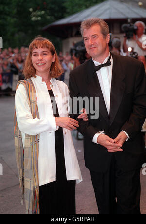 Actress Tara Fitzgerald and writer director Christopher Monger arriving for the charity premiere of the film The Englishman who went up a hill but came down a mountain. Stock Photo