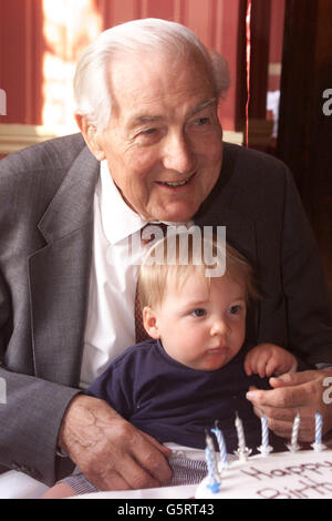 Former Labour Prime Minister Lord Callaghan cuddles his youngest great-grand child Jay, 10 months, as he celebrates his 90th birthday with his family including three children 10 grand children and five great grand children at a party near his East Sussex home. Stock Photo