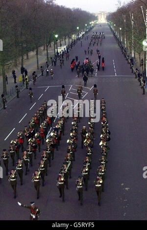 The rehearsal for the ceremonial procession that will carry the Queen Mother's coffin from the Queen's Chapel to Westminster Hall passes along The Mall and into Horse Guards in London . *The procession will stretch for half a mile, involve 1,600 servicemen and women and will be largest pageant of its sort on Britain's streets since the funeral of Sir Winston Churchill in 1965. The coffin of the Queen Mother, who died Saturday, aged 101, will then lie-in-state until her funeral on Tuesday. Stock Photo