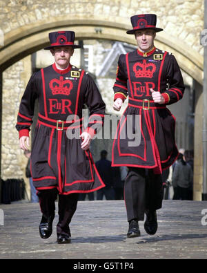 Yeoman Warders (Beefeaters), Chris Morton (left) and Vic Lucas train for the London Marathon at the Tower Of London. *The two will swap their pikes for running shoes on Sunday to raise cash for The British Limbless Ex-Serviceman's Association and St Dunstan's for the Blind. Stock Photo