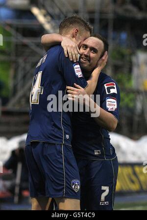 Oldham Athletic's Matt Smith celebrates with team-mate Lee Croft (right) after scoring their second goal of the game Stock Photo