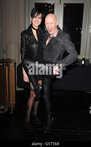 Sabrina Graf (left) and Richard O'Brien arrive at the opening night of The Rocky Horror Show 40th Anniversary UK Tour at the Wimbledon Theatre in London. Stock Photo
