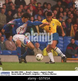 06-JUN-1995 ... Brazil v Japan ...Japan's Naoki Soma holds off Brazil's Jorginho ... PicSteve Morton Stock Photo