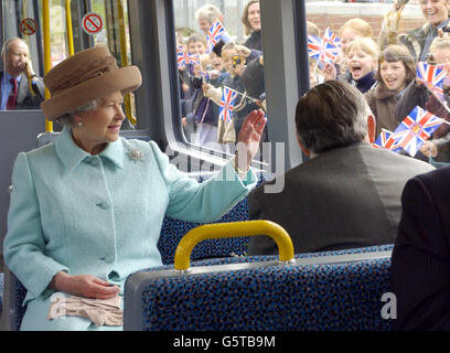 Queen Elizabeth II passes through Brockley Whins station on the new Sunderland to Newcastle Metro Link after officially opening it at the Park Lane interchange, Sunderland. The Queen arrived in Sunderland today on the second leg of her nationwide Golden Jubilee tour. * Accompanied by the Duke of Edinburgh, she travelled overnight to the North East on the Royal Train. Stock Photo