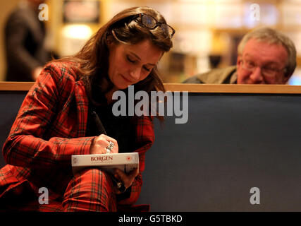 Sidse Babett Knudsen, the star of Danish hit drama Borgen, signs autographs at the Filmhouse in Edinburgh, ahead of a screening of the series two finale and a question and answer session with fans. Stock Photo