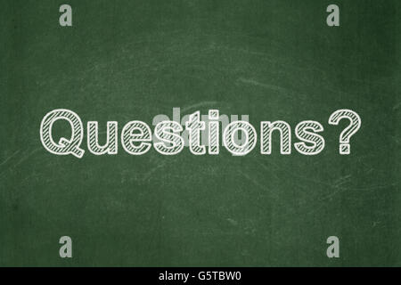 Studying concept: Questions? on chalkboard background Stock Photo