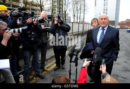 Former TV presenter Stuart Hall reads a statement outside Preston Magistrates Court. Stock Photo