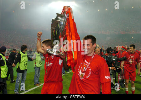 Liverpool's Steven Gerrard (left) and Jamie Carragher celebrate with the trophy Stock Photo