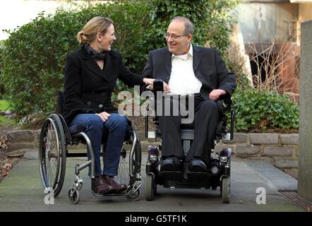 Amit Goffer (right) the scientist, quadriplegic and inventor of the Rewalk Bionic Suit, meets with Disability Campaigner and paralysed athlete Claire Lomas, who was the first ever UK user of the suit, famed for completing the London Marathon in 17 days, at the Institute of Education, central London. Stock Photo