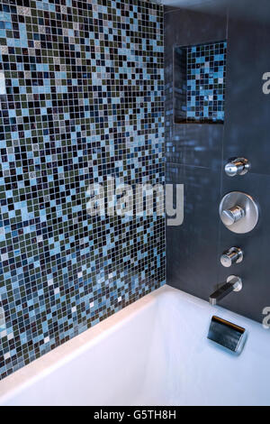 Mosaic tiles inside shower bath Stock Photo