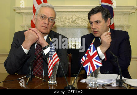 Chancellor Gordon Brown (right) and US Treasury Secretary Paul O'Neill give a news conference in London to announce their combined progress at freezing terrorist assets. Brown called for a new generation of codebreakers, comparable to those who broke the Nazis' Enigma code. *... to come forward to track down the secret flow of international terrorist funds. Stock Photo