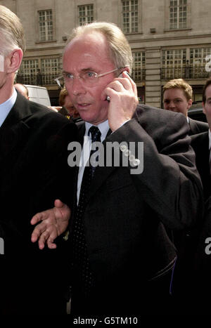 England coach Sven Goran Eriksson arrives at the Cafe Royal in Regent Street where he was due to give a talk on leadership to businessmen. As he arrived he climbed out of his black cab while speaking on a mobile phone and walked straight into the venue without speaking. *...to attend the second Institute of Directors Business Leaders Summit. According to a report in today's Daily Mirror he and Ulrika Jonsson have formed a friendship. Agent Melanie Cantor said neither she nor Ms Jonsson would comment and Paul Newman, head of communications for the Football Association, would say only: 'This is Stock Photo