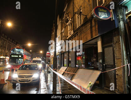 Man killed by shop sign. The scene outside the Camden Road William Hill betting shop, after a man was killed by a falling sign. Stock Photo