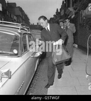 Dr Stephen Ward about to enter a car as he left a friend's flat in Mallord Street, Chelsea, London, on the third day of the Old Bailey trial on vice charges. He has pleaded not guilty to all five counts. Stock Photo