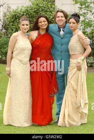 TV presenter Jonathan Ross with former 1997 Miss World Diane Hayden (2nd left) and Indian dancers Ishrat Shan (left) and Karishma Kotak (right) during the launch of 'From India with Love' at the Porchester Hall. * Five of Bollywoods biggest stars are due to appear in two massive outdoor extravaganzas, called 'From India With Love' at Manchester's Old Trafford June 29th and London's Hyde Park June 30th. Stock Photo