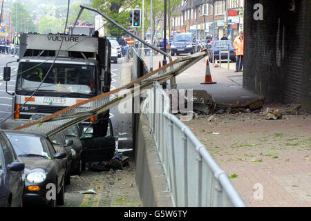 Debris under the bridge at Potters Bar, Hertfordshire after the train crash at the station. A West Anglia Great Northern spokeswoman said it was thought that about 20 to 30 people were in the carriage that hit the bridge - 5 passengers are reported dead and several people injured. Stock Photo